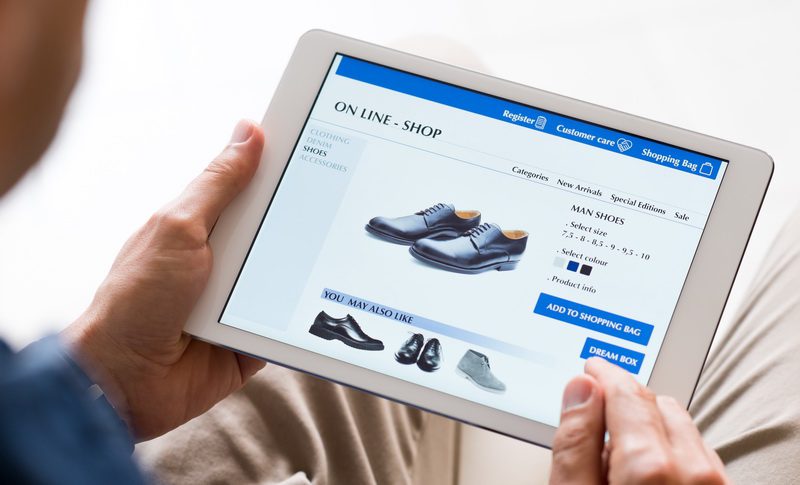 Man buying shoes online