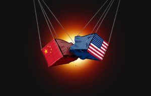 China USA Conflict and trade war with American and Chinese cargo freight containers fighting as an economic and geopolitical dispute concept as a 3D illustration.